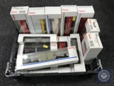 A basket of thirteen Marklin HO scales tankers and cargo trucks, boxed.