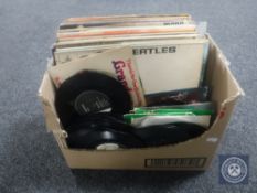 A box of LP's and singles - Beatles,