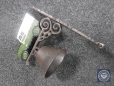A cast iron bell on bracket