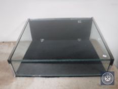 A glazed counter top display cabinet