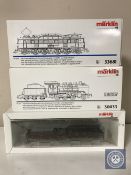 Three boxed Marklin HO gauge diesel locomotive engines 33681 30033 and 34551.