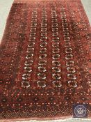 A Tekke design rug 174 cm x 207 cm