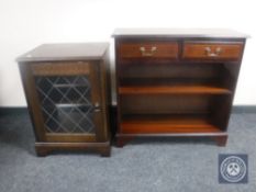 A set of open inlaid mahogany bookshelves,