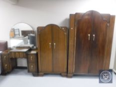 A three-piece 1930's oak bedroom suite,