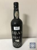 A bottle of 1934 Bual Miles Madeira wine, 75 cl.