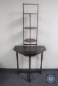 A 20th century shaped oak hall table and a Victorian folding cake stand