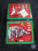 A cased microscope with accessories