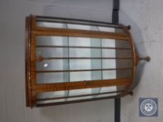 A 20th century mahogany D-shaped display cabinet