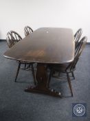 An Ercol refectory table and four chairs