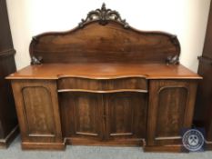 A Victorian mahogany serpentine fronted sideboard,