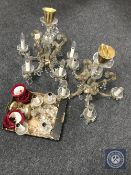 Two early 20th century continental glass chandeliers with drops together with a pair of similar