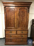 An early Victorian mahogany linen press,