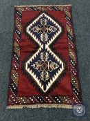 A Baluchi rug 135 cm x 79 cm