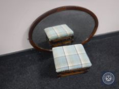 An inlaid mahogany oval framed mirror and an Edwardian footstool
