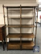 A Regency style display stand fitted with two drawers,