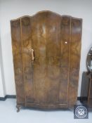 A 1930's walnut Art Deco wardrobe