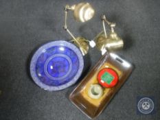 A pair of brass angle poise lamps together with a glazed pottery charger, twin handled shallow dish,