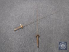 Two antique fencing foils