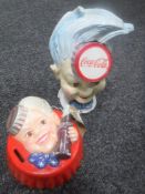 Two cast iron Coca Cola money boxes