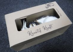 A boxed metal scooter