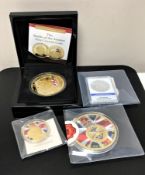 A silver proof dollar together with a cased Battle of the Somme five crown coin,