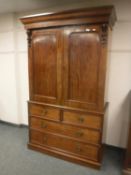 An early Victorian mahogany linen press,
