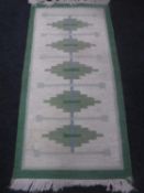 Two rugs of geometric design