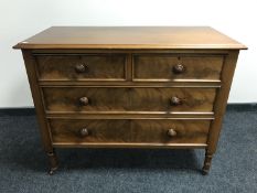 An Edwardian mahogany four drawer chest