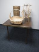 A folding card table, bamboo magazine rack,