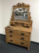 A late Victorian satinwood dressing chest