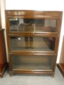 An oak three tier stacking bookcase,