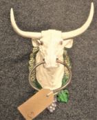 A cast metal cow head