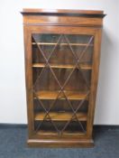 A continental mahogany glazed door bookcase