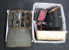 A cased Pentax KM camera and lens, bag,