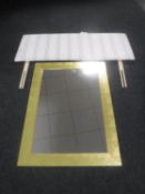 A gilt framed mirror and a 4'6 headboard