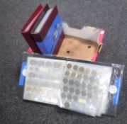 A box of three coin albums and British 5p,