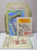 Four shop signs on cardboard