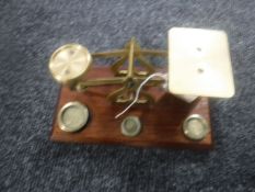 A set of brass postal scales