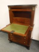 A marble topped Empire style mirrored cabinet,
