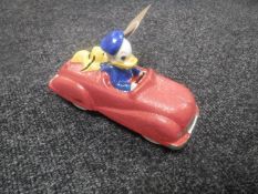 A cast metal figure of Donald Duck