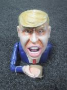 A cast metal money box Donald Trump