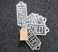 Five cast metal art deco style signs