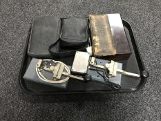 A tray of two Morse Code tappers, vintage calculator with charger,