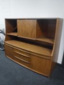 A 1970's teak sideboard