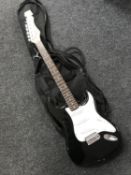 A Ridgewood electric guitar in carry bag,