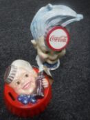 Two cast iron Coca Cola money boxes