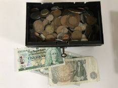 A tin of pre-decimal coins, crowns,