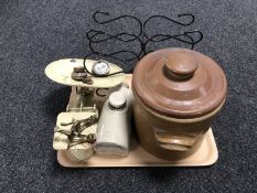 A tray containing vintage stoneware crock with lid, stoneware hot water bottle,