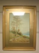 William Baker (1863 - 1937) : A lady walking along a country track with lake beyond, watercolour,