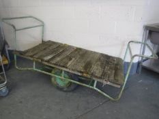A mid 20th century metal framed trolley